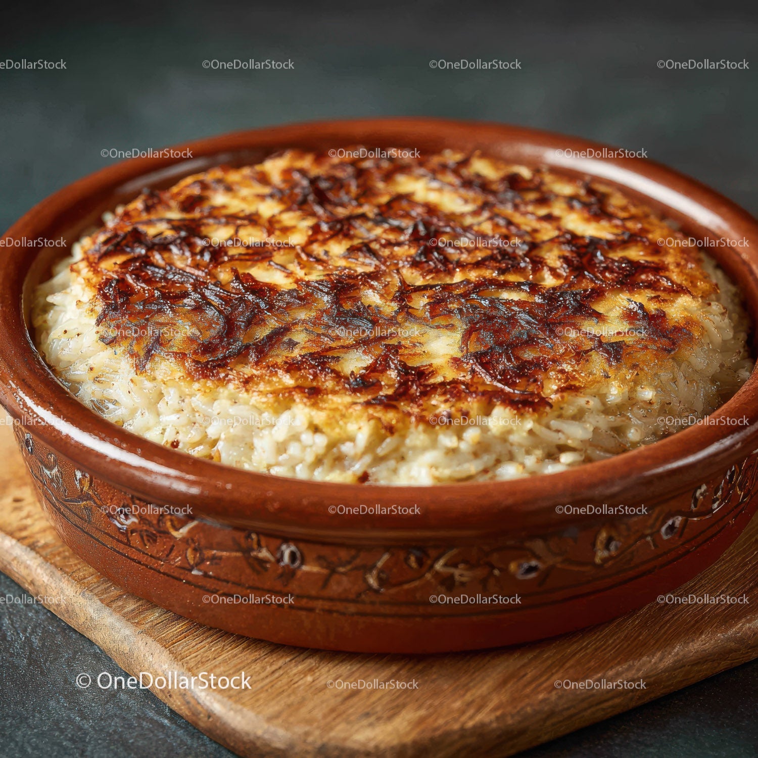 Creamy Baked Rice Casserole with Crispy Top in Rustic Clay Pot