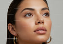 Close-up Portrait of a Young Woman with Flawless Skin and Brown Eyes