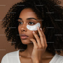 Young Woman Applying Under-Eye Gel for Refreshing Skincare