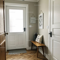 Calm Modern Entryway with Wooden Bench and Wall Art in Neutral Tones
