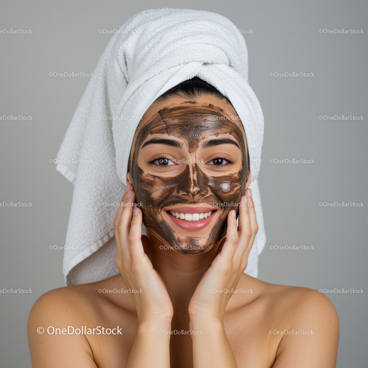 Woman with Brown Face Mask and Towel on Head in Spa Environment