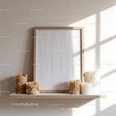 Minimalist blank wooden frame with decorative candles on shelf JPG Mockup Image preview