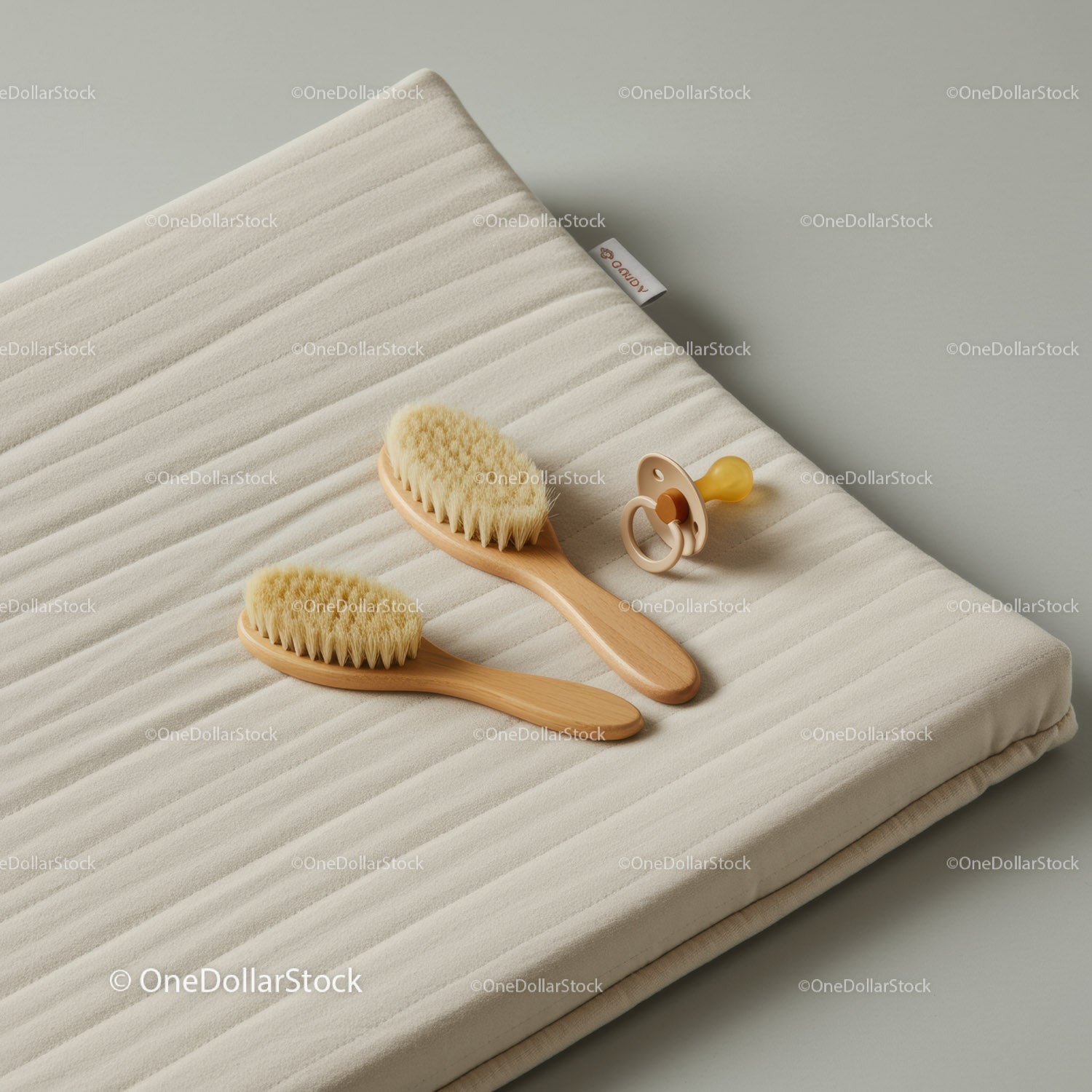 Natural Baby Brush Set with Pacifier on Soft Mat