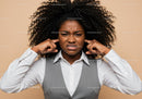 Fuming Woman Covering Ears Showing Frustration or Discomfort