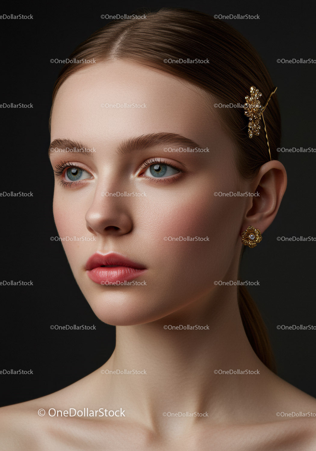 Elegant Beauty Portrait of a Woman with Blue Eyes and Gold Jewelry