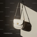 Minimalist white leather shoulder bag with gold details