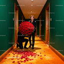 Man Surprised by Huge Bouquet of Red Roses