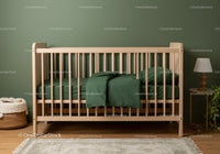 Wooden Baby Crib with Green Bedding in Modern Nursery