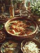 Herb-Seasoned Roast Chicken Cooking in Rustic Kitchen