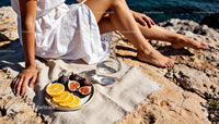 Relaxing Outdoor Moment with Fresh Fruit and Water