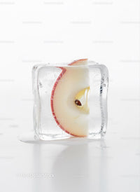 Fresh Apple Slice Frozen Inside Melting Ice Cube