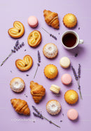 Assorted French Pastries with Coffee and Lavender on Purple