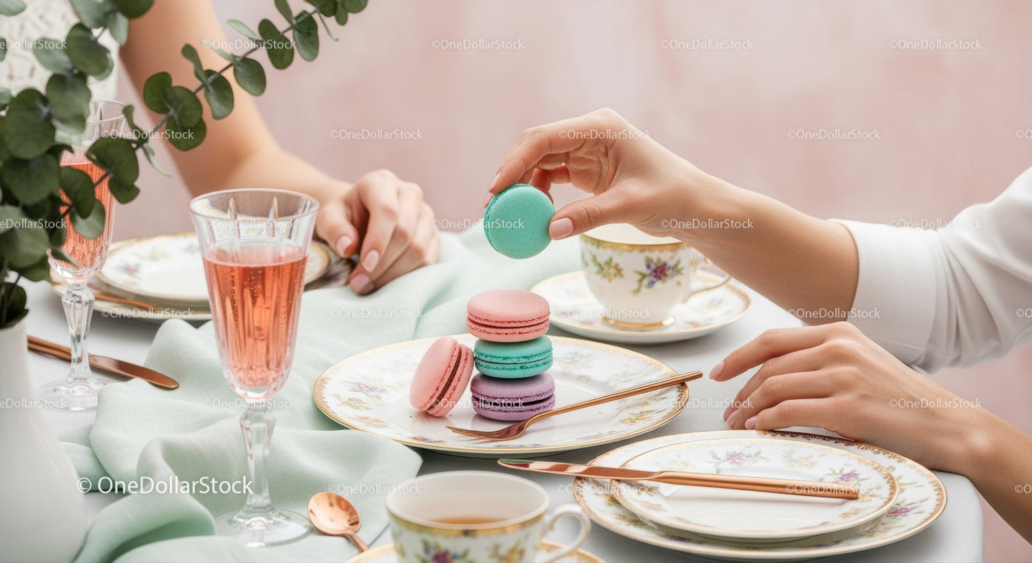 Elegant Tea Party Scene with Pastel Macarons and Fine Tableware