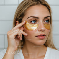 Close-up of Woman Applying Gold Eye Patches for Skincare
