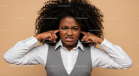 Frustrated Woman Covering Ears with Annoyed Expression