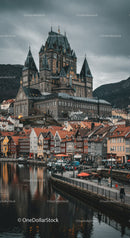 Colorful Houses and Gothic Castle by the Waterfront in a Historic European City