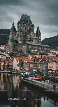 Colorful Houses and Gothic Castle by the Waterfront in a Historic European City