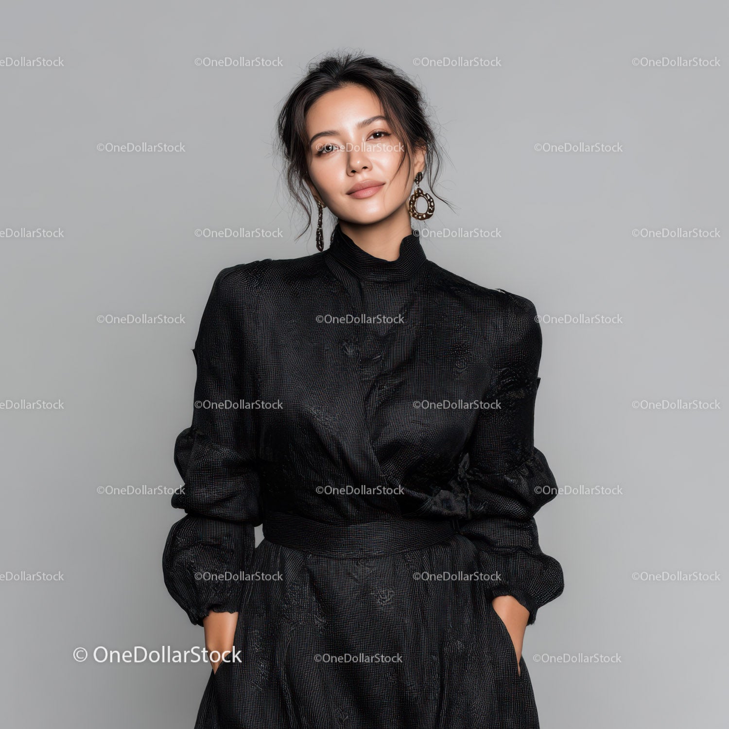 Elegant Woman in Black Dress with Statement Earrings in Studio