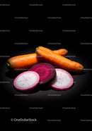 Fresh carrots and sliced radishes on black background