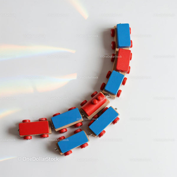 Curved Wooden Toy Train Cars In Red And Blue