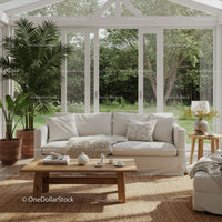 Cozy living room with natural light and greenery views