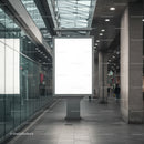 Modern Urban Corridor Featuring Illuminated Advertising Board