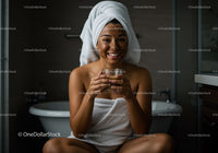 Smiling Woman with Facial Mask and Towel Wrap in Bathroom