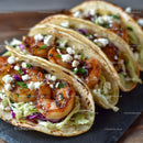 Seafood Shrimp Tacos with Fresh Vegetables and Spicy Sauce