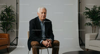 Confident Senior Man in Professional Portrait Setting