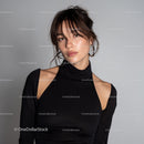 Stylish Young Woman in Black Turtleneck with Confident Expression