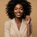 Vibrant Smiling African American Woman in Beige Blazer with Curly Hair