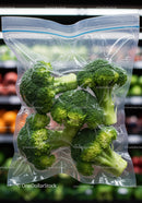 Fresh broccoli florets sealed in clear plastic bag