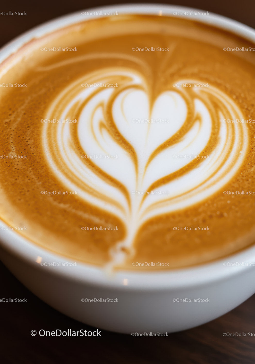 Close up of latte coffee with heart shaped foam art
