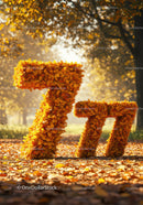 Autumn Numbers Seven Shaped from Orange Leaves in Park