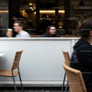 Blurred motion at a modern urban cafe window