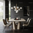 Elegant Modern Dining Room with Pendant Light and Beige Chairs