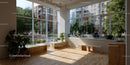 Bright Modern Room with Large Windows and Indoor Plants in Urban Setting