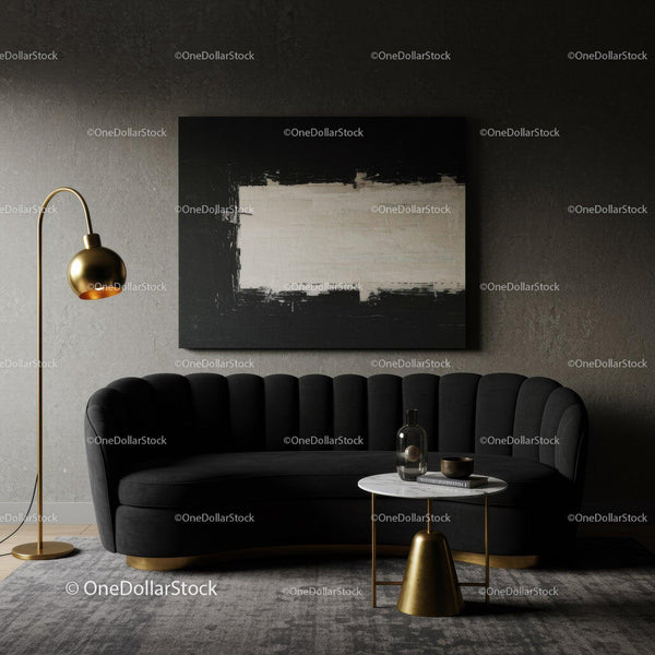 Modern living room with black sofa and gold accents