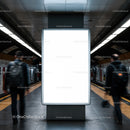 Empty illuminated billboard in busy subway station
