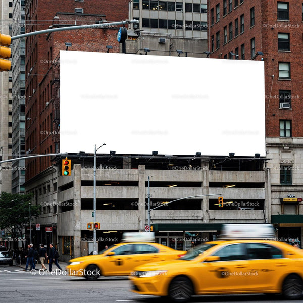 Urban intersection with yellow taxis and blank billboard JPG Mockup Image
