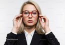 Businesswoman with Red Glasses and Blonde Hair in Studio
