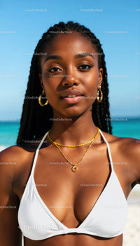 Stylish Woman in White Bikini with Gold Jewelry at Beach