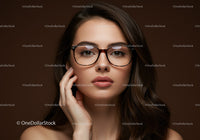 Beautiful woman with stylish glasses and elegant makeup