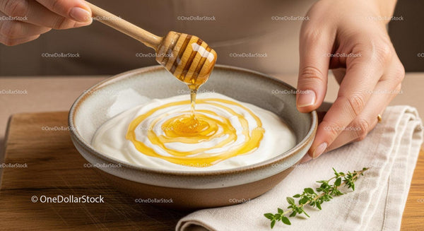 Drizzling Honey Over Creamy Greek Yogurt in a Rustic Bowl