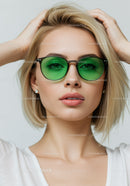 Stylish Blonde Woman Wearing Green Sunglasses in Portrait