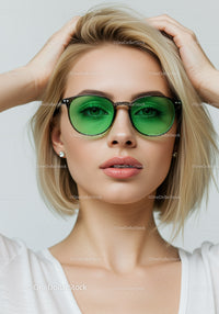 Stylish Blonde Woman Wearing Green Sunglasses in Portrait