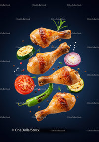 Golden roasted chicken drumsticks with fresh vegetables