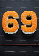 Sushi Pieces Shaped as Numbers Sixty Nine on Black Slate