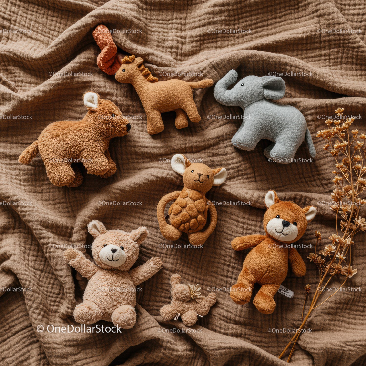 Assorted Plush Animal Toys on Soft Brown Blanket
