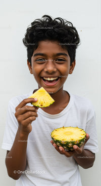 Joyful Child Holding Slices of Fresh Pineapple Smiling Brightly